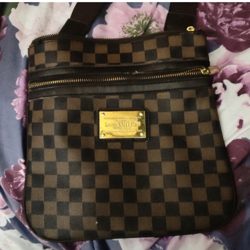 LV Brand new never wore *everything perfect condition every zipper works perfect